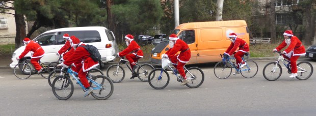 Santas cycling.
