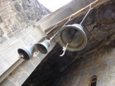 the cave city included 13 churches, some still in use today, here a decorated ceiling and church bells